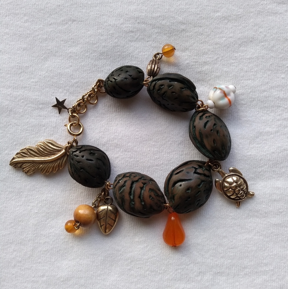 'peach pit' charm bracelet